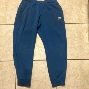 Nike Blue Sweatpants with Elastic Cuffs and Tapered Fit